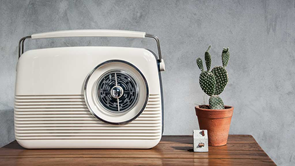 digital radio on wooden table at home