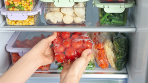 food prep storage containers of fresh produce in a fridge