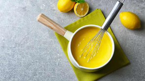 sauce pan with lemon curd cooking